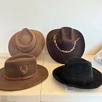 Group shot of the four hats