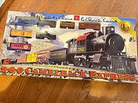 Front of boxed President's Choice Camelback Express train set showing contents