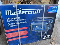 Front of sealed Mastercraft generator box showing product image and 3300 W / 2400 W rating