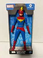 Front view of boxed Captain Marvel action figure
