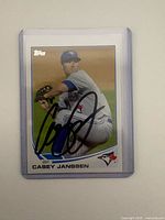Front view of Casey Janssen autographed Topps card in sleeve