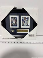 Front view of framed Dak Prescott 2-card display with protective corners