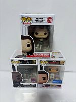 Front view of three boxed Funko POP figures stacked: Sloane Peterson (#1730), Boastful Loki (#984), Wenwu (#851)