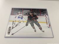 Front view of autographed Mark Kastelic 8x10 photo in sleeve