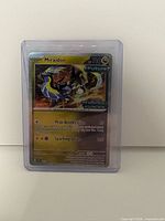Front of Miraidon holofoil card in sleeve