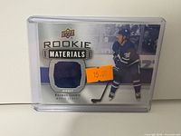 Front view of Rookie Materials Rasmus Sandin jersey card showing patch and player image