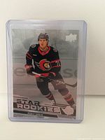 Front view of Ridly Greig Star Rookies card in sleeve