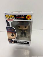 Front view of boxed Sergio Perez Funko Pop figure