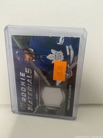 Front of Rookie Materials jersey card in plastic holder