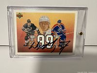 Front of autographed Wayne Gretzky card in holder