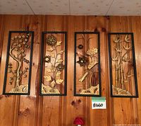 Full set of four framed panels on wall