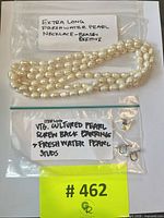 bags showing necklace and earrings with labels