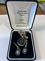 Set in original case showing necklace and earrings