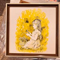 Front view of framed lithograph showing artwork, frame, signature