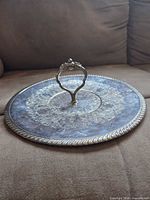 Top view displaying engraving, handle, overall patina