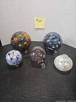 All five glass balls grouped