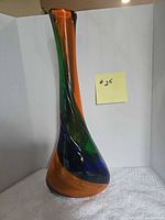 full view of multicolour swirl glass vase front
