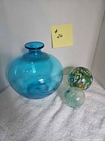 Blue vase and two glass balls overall view