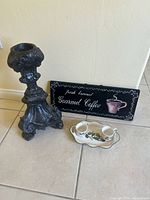 Group shot showing platter with shakers, coffee sign, cast metal pedestal