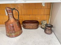 Group shot of all four items showing relative sizes