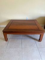 Top and legs of square solid wood coffee table