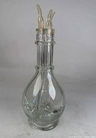 Full view of hand-blown four-way split decanter showing three spouts