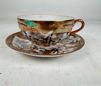 teacup on saucer showing exterior decoration