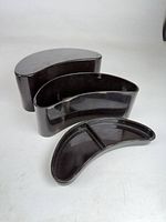 three kidney-shaped lacquer pieces displayed: base, cover, tray