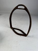 Front view of oval iron stirrup showing overall form