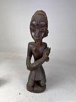 Front view of carved statue