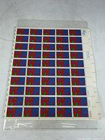Full sheet of 50 Love 8c stamps in protective sleeve