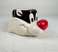 Front left view of Sylvester character mug