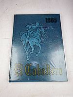 Front cover showing embossed knight, gold lettering, year stamp
