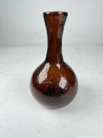 Full view of brown hand-blown glass vase