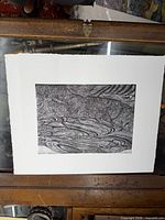 Full sheet view showing print and deckle edge