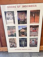 Front view showing full poster, images, title text, and wood frame