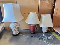 All three lamps with shades and cords visible