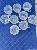 Top view of eight textured clear glass cups