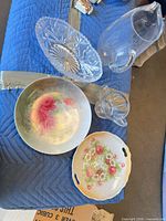group shot of all five pieces showing porcelain bowl, porcelain tray, oval pressed glass dish, glass pitcher, cut glass creamer