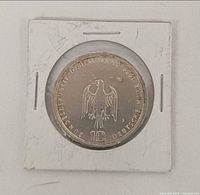 Obverse of 1989 German 10 DM coin in holder
