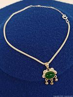 Full bracelet shown on display with charm centered