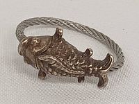 Top view showing koi fish detail on ring