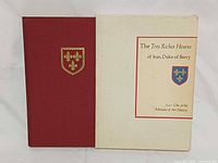 Book and slipcase front view showing crest and titles