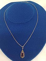 Full view of necklace on display bust