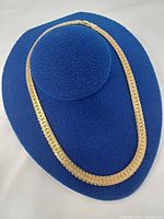 Full view of necklace on display bust