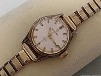 Front view showing dial, markers and hands