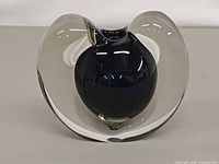 Front view of clear crystal vase with blue core