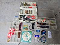 Overall lot with tackle box open, two organizers, tools and line spools visible