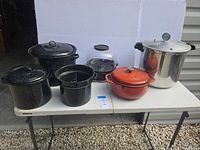 Group shot of all cookware items on table