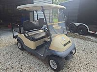 Front/side view showing body color, windshield, roof, seats, wheels